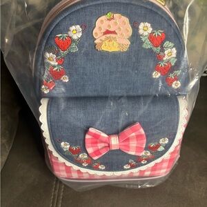 Loungefly Denim and Pink Strawberry Backpack